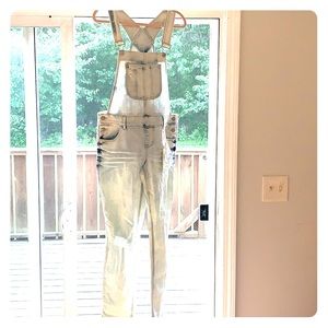 Distressed overalls light wash